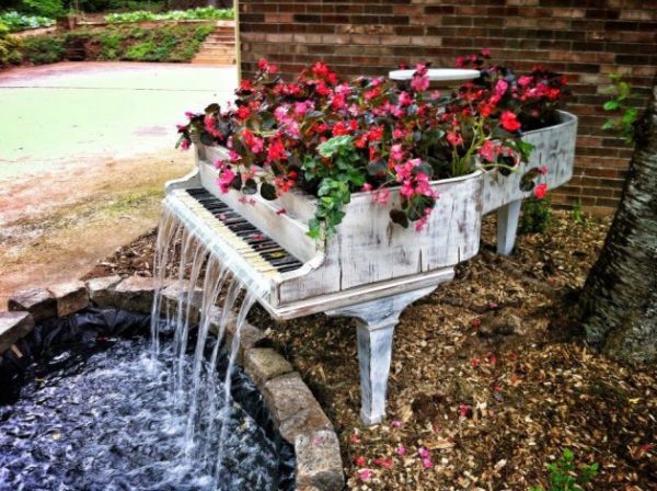Old piano turned into outdoor fountain.jpg
