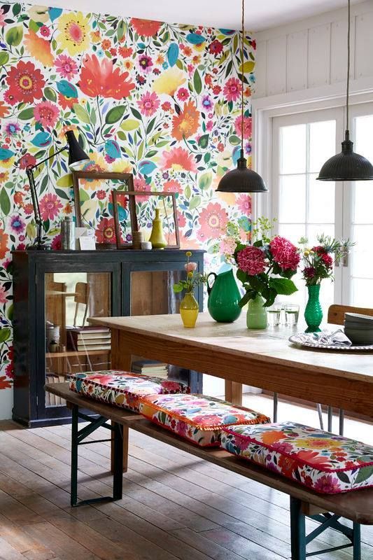 15 colorful floral wallpaper and matching cushions for a dining space.jpg