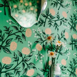 17 bold green wallpaper with yellow floral prints screams spring and summer and adds cheer to the bathroom.jpg