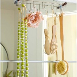 Hang a hook rod over the mirror for some extra storage space.jpg