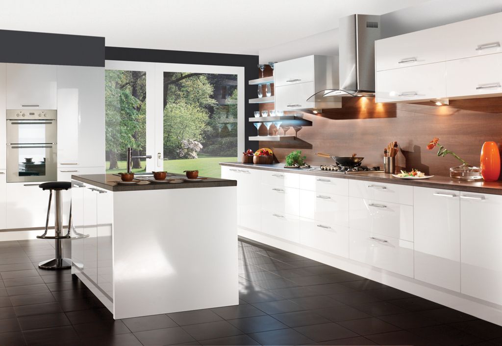 Interesting white kitchen ideas with dark floor tiles also laminated wooden countertop and backplashes combine with storage and drawers plus standing cooker feat cooker hood also built in oven.jpg