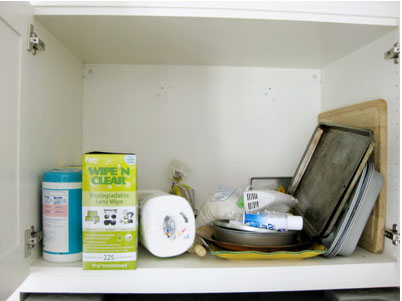 Organization above the fridge before.jpg