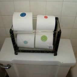 Re use an old aquarium for toilet paper storage.jpg
