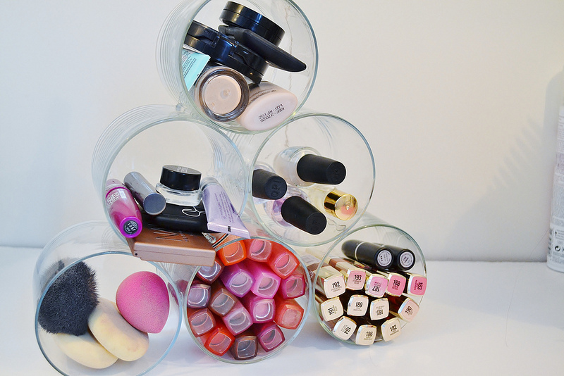 Repurpose old candle jars into a makeup organizer.jpg