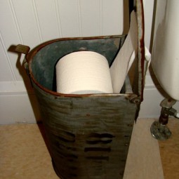 Repurposed mailbox for toilet paper storage.jpg
