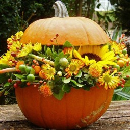 Autumn decoration pumpkin with flowers.jpg