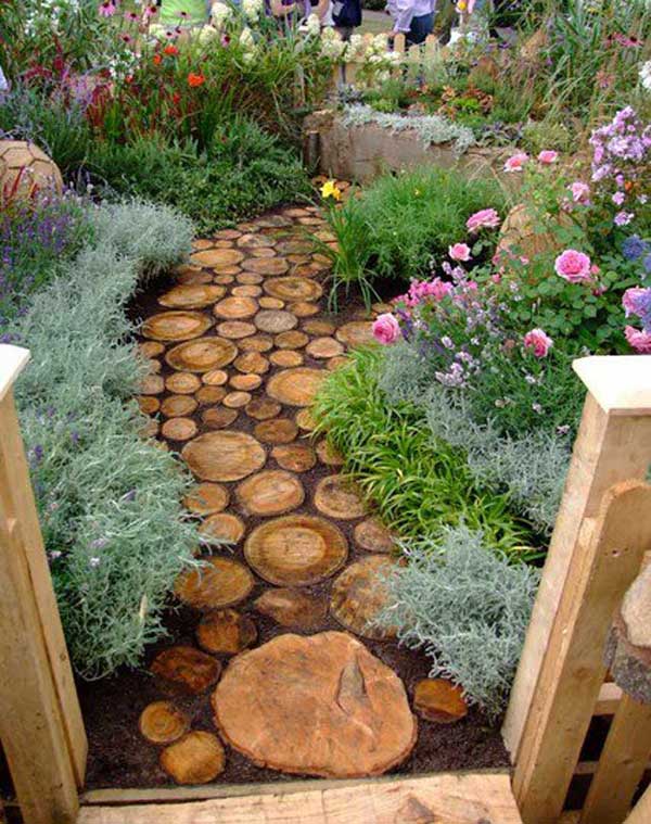 Reuse an old tree to make a log pathway. share if you like the idea..jpg