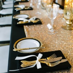 Black and gold wedding table decor.jpg