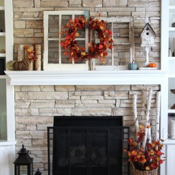 Fall fireplace decor idea with old windows and fall leaves.jpg