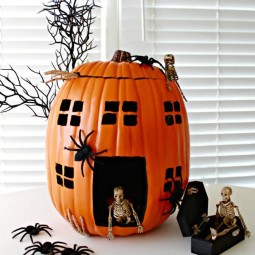 Haunted house skeleton pumpkin made with a foam pumpkin.jpg