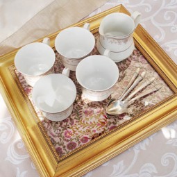 Turn old picture frames into serving trays.jpg