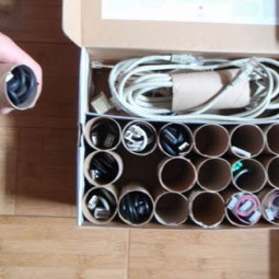 Use old toilet paper rolls to store organize cables and chords.jpg