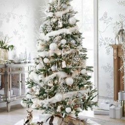 Beautiful silver and white christmas tree and decor with animal theme.jpg