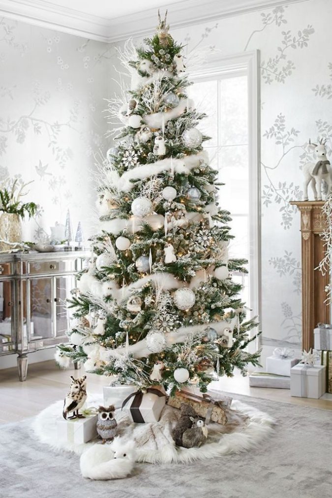 Beautiful silver and white christmas tree and decor with animal theme.jpg