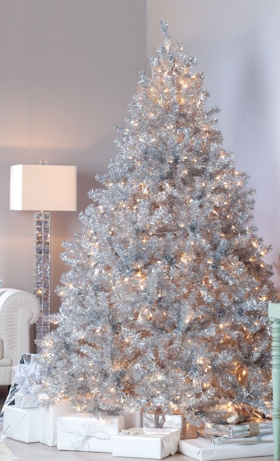 Beautiful silver christmas tree full of lights.jpg