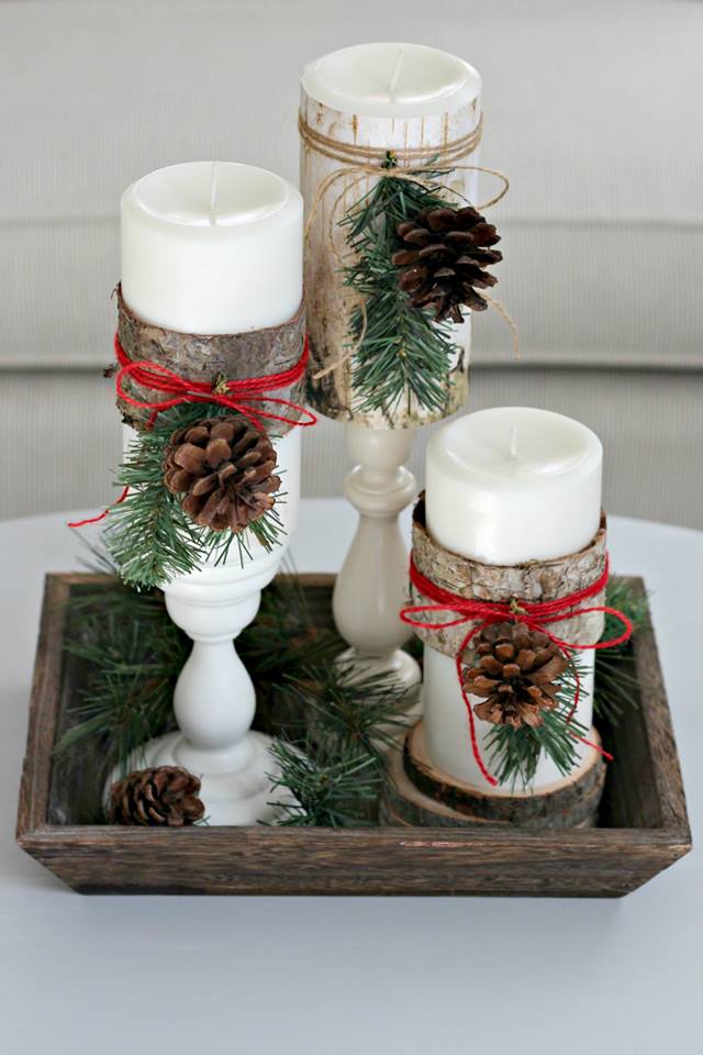 Chic wood wrapes candles with pine cones.jpg