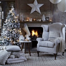 Cozy and stylish christmas tree in front of fireplace in all shades of grey.jpg