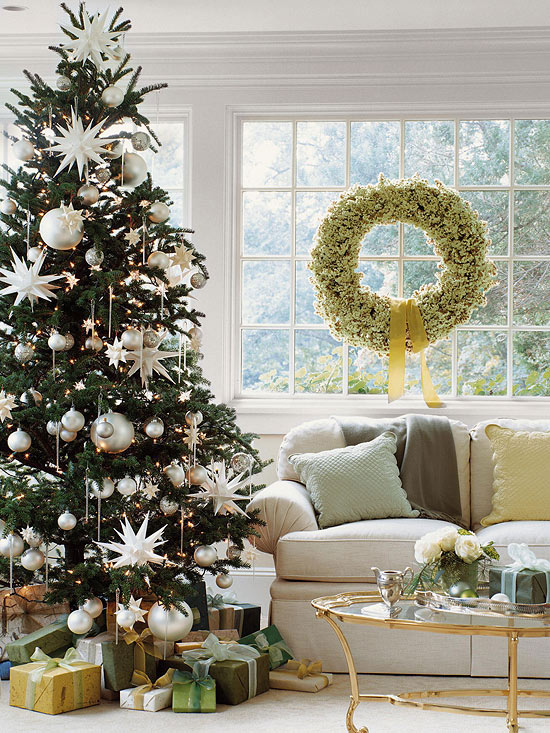 Elegant christmas tree decorated with all silver ornaments and gorgeous floral wreath.jpg