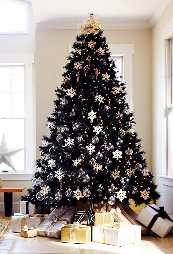 Modern black christmas tree with black and white ornaments.jpg