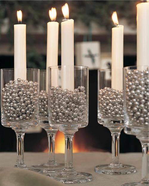 Stylish candle holder with silver balls in glass holder.jpg