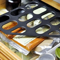 Use magazine files to corral clutter in kitchen drawers.jpg
