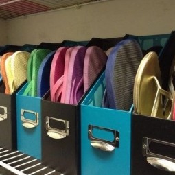 Use old magazine holders to store flip flops and sandals.jpg