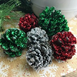 Pine cone crafts pinecone christmas decorations easy diy glitter pinecones horz.jpg