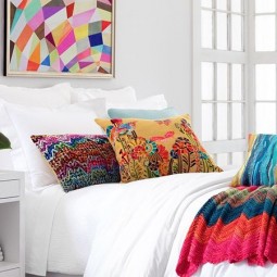 A white bedroom with pops of color.jpg