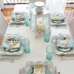 Beach table setting with shell and sailboat plates aa 1.jpg