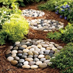 1001gardens.org 20 diy ideas for garden decor with pebbles and stones 01 728x801 688x757.jpg