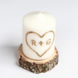 Candle carved with initials.jpg