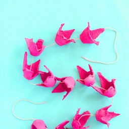 Make a beautiful flower garland with egg cartons and spray paint.jpg