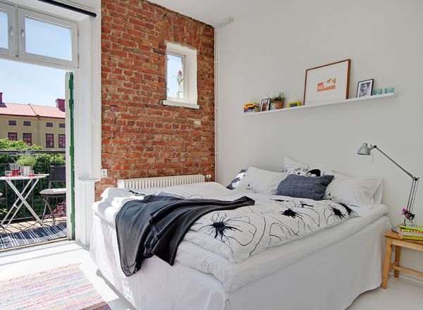 Small bedroom with brick wall exposed brick bedroom d63cf92774a78a72.jpg