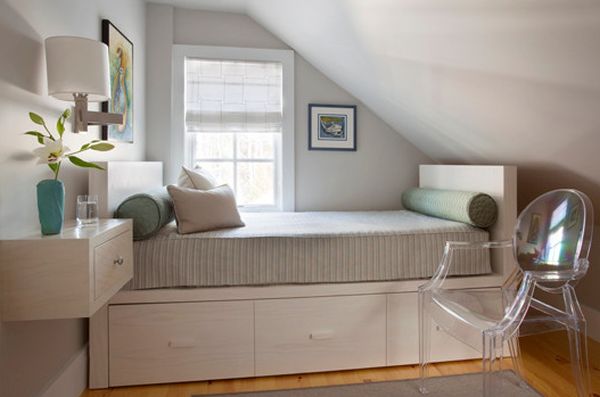 Storage underneath the bed and decor that does away with legs perfect for small bedrooms.jpg