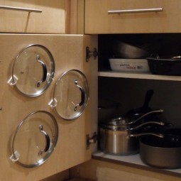 Use adhesive hooks to organize your pot lids.jpg
