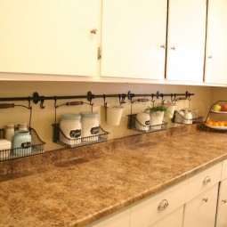 Use fintorp rail and baskets to de clutter your counter.jpg