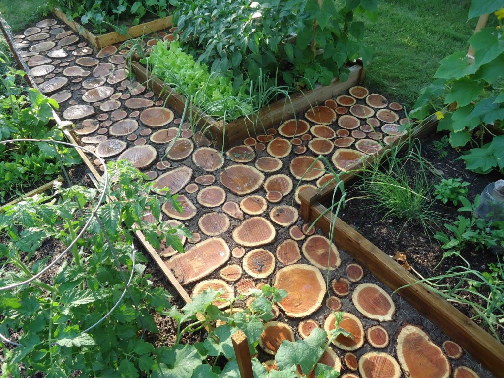 Use left over logs to create unique garden path.jpg