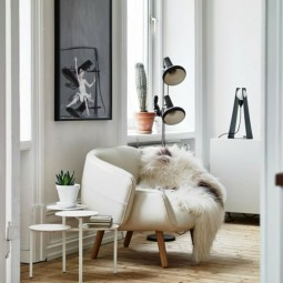Wohnzimmer skandinavisch einrichten origineller sessel.jpg