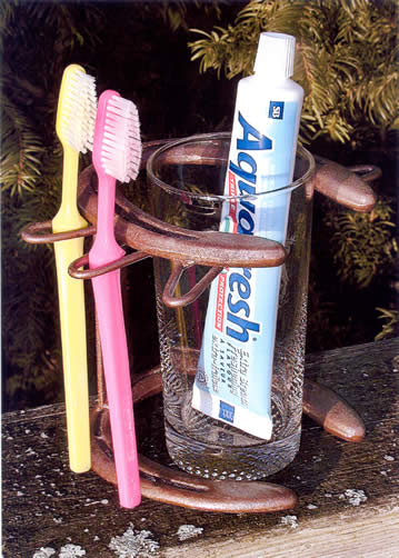 Horseshoe toothbrush holder.jpg