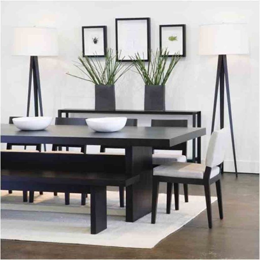 Japanese dining room ideas with white rug and black modern table ideas using tripod floor lamp.jpg