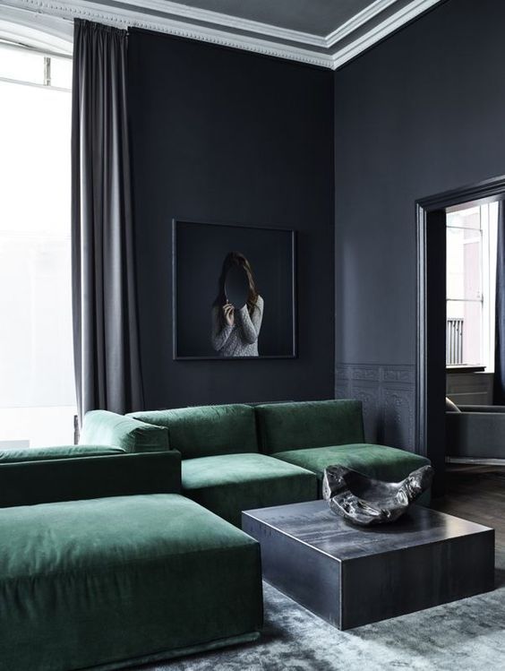 04 elegant graphite grey living room with an amazing emerald green sofa.jpg