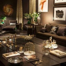 20 dark chocolate living room with metallic accents and greenery.jpg