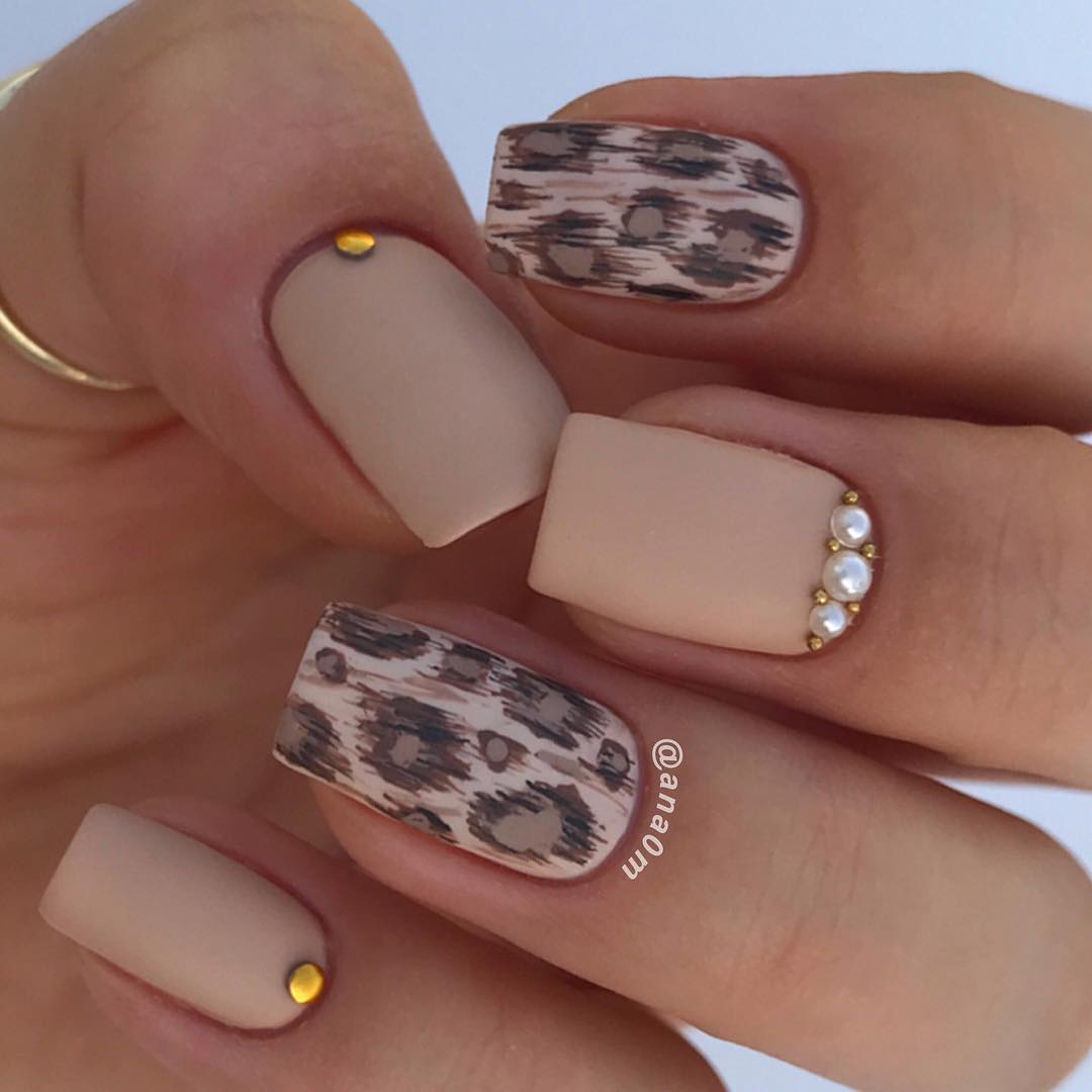 Leopard printed nails cougar design.jpg