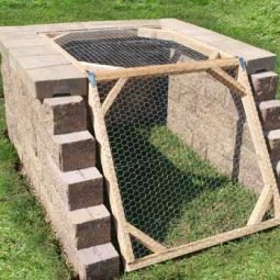Angled compost bin to keep critters out.jpg