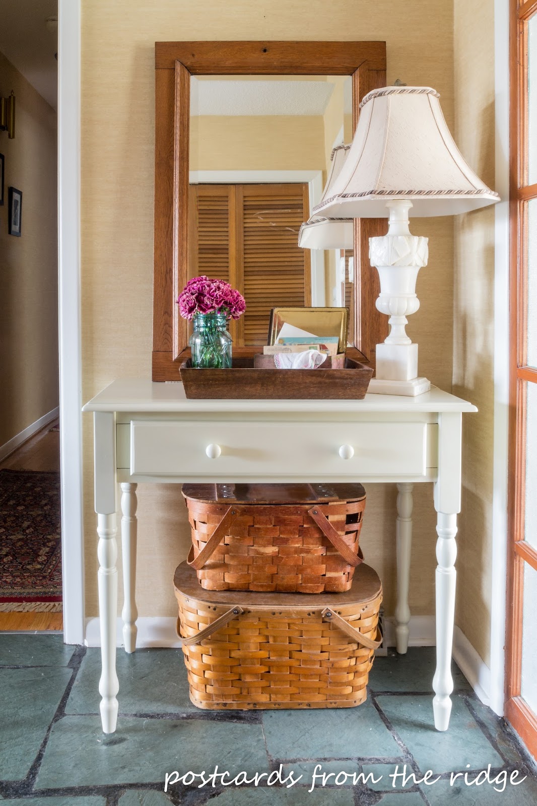 Small entry with a writing desk for a table. _ postcards from the ridge.jpg
