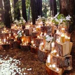 Dramatic stacked wood stump backdrop for wedding ceremony altar.jpg