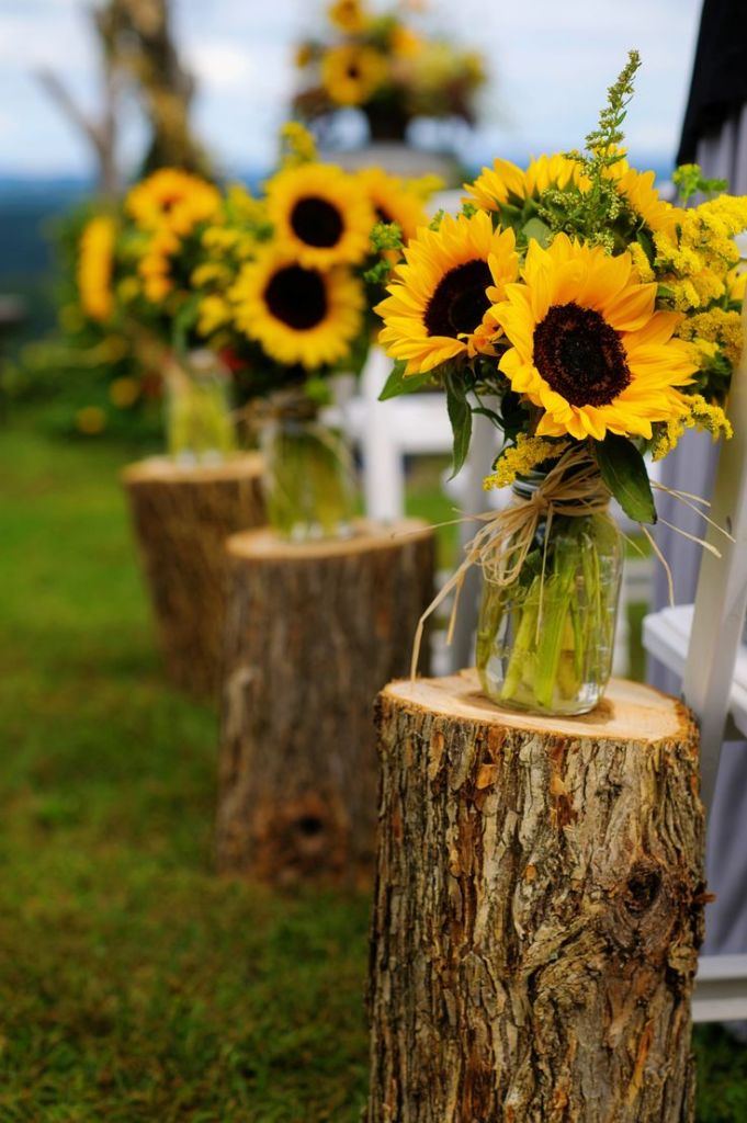Rustic aisle decor ideas sunflowers in mason jars 681x1024.jpg