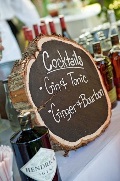 Specialty drinks displayed on a painted tree stump.jpg