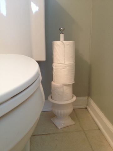 Toilet paper holder from a pot and a dowel.jpg