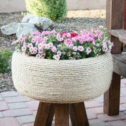 Recycled tire turned gorgeous planter.jpg